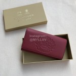 Burberry New Embossed Leather Long Wallet Purplish Red