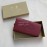 Burberry New Embossed Leather Long Wallet Purplish Red