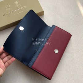 Burberry New Embossed Leather Long Wallet Purplish Red