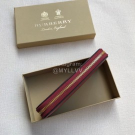 Burberry New Embossed Leather Long Zipper Wallet Purplish Red