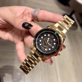 Gucci Dive Sapphire Glass Steel Strap Watch Gold