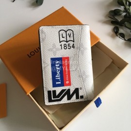 Louis Vuitton Multiple Classic Old Flower Badge Vertical Short Wallets White M67817