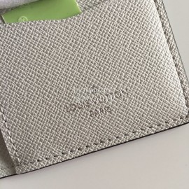 Louis Vuitton Multiple Classic Old Flower Badge Vertical Short Wallets White M67817