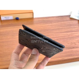 Louis Vuitton Multiple Cowhide Embossed Short Wallets Black M69037