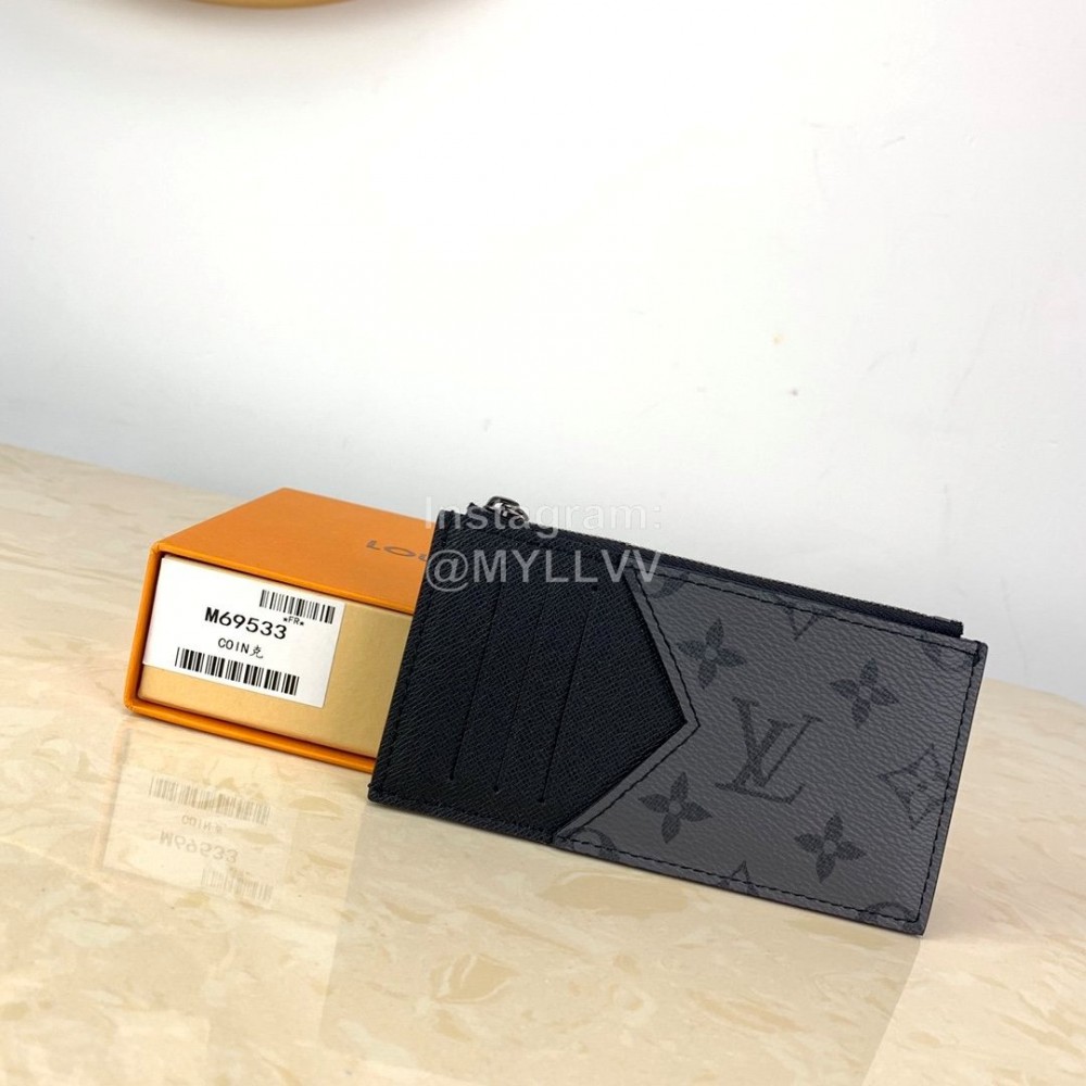 Louis Vuitton Coated Canvas Cross Grain Leather Clip Gray M69533