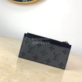 Louis Vuitton Coated Canvas Cross Grain Leather Clip Gray M69533