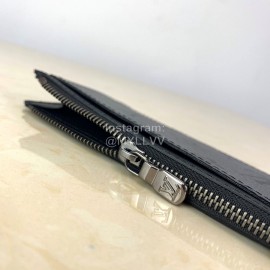 Louis Vuitton Coated Canvas Cross Grain Leather Clip Gray M69533