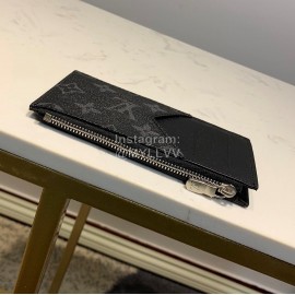 Louis Vuitton Exquisite Printed Leather Wallet Clip Black M64038